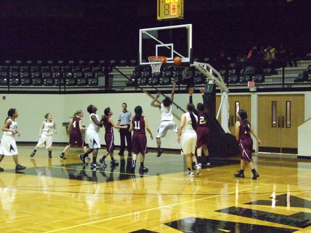 Image: Kortnei Johnson #3 goes up and scores.