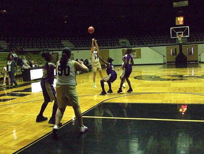 Image: Caroline Pittman(14) attempts a 3-pointer in the second half against Marlin.
