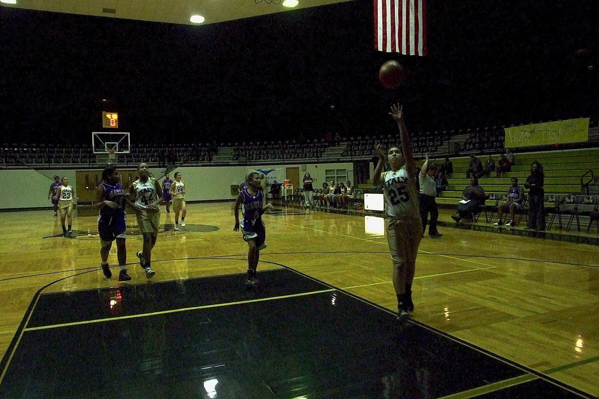 Image: Elizabeth “Lizzy” Garcia(25) steals the ball and then lays it in early in the first-quarter against Marlin’s A-Team Lady Bulldogs.