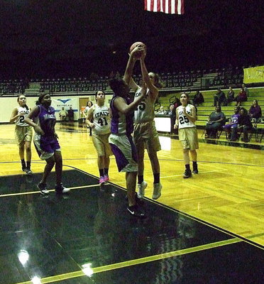 Image: Italy JH’s Brooke DeBorde(15) tries to shoot over Marlin’s post.