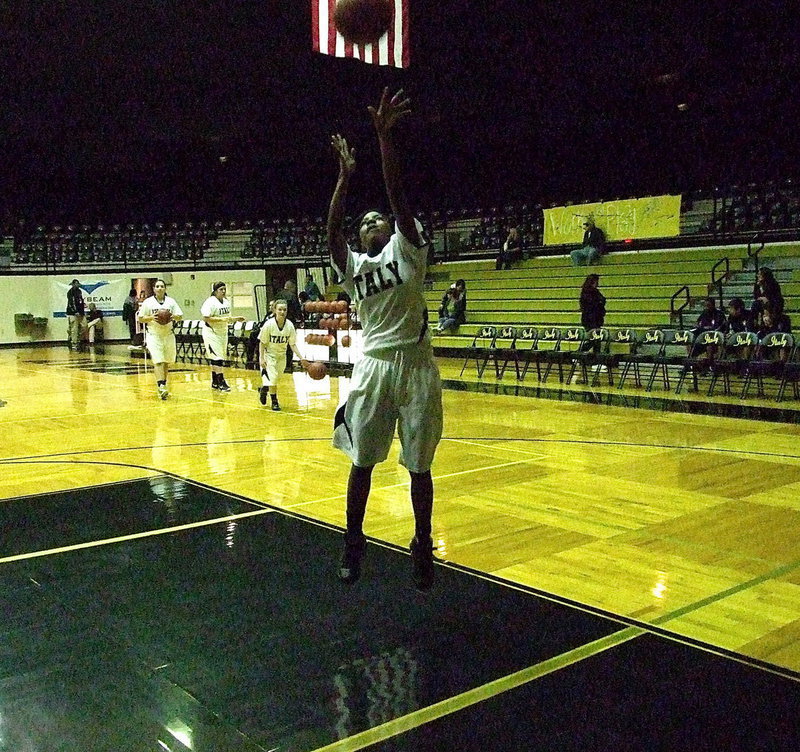 Image: Lady Gladiator Kendra Copeland during pre-game warmups.