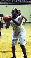 Image: Taleyia Wilson(22) knocks down a pair of free shots for the Lady Gladiators against the GPAA Lady Eagles.