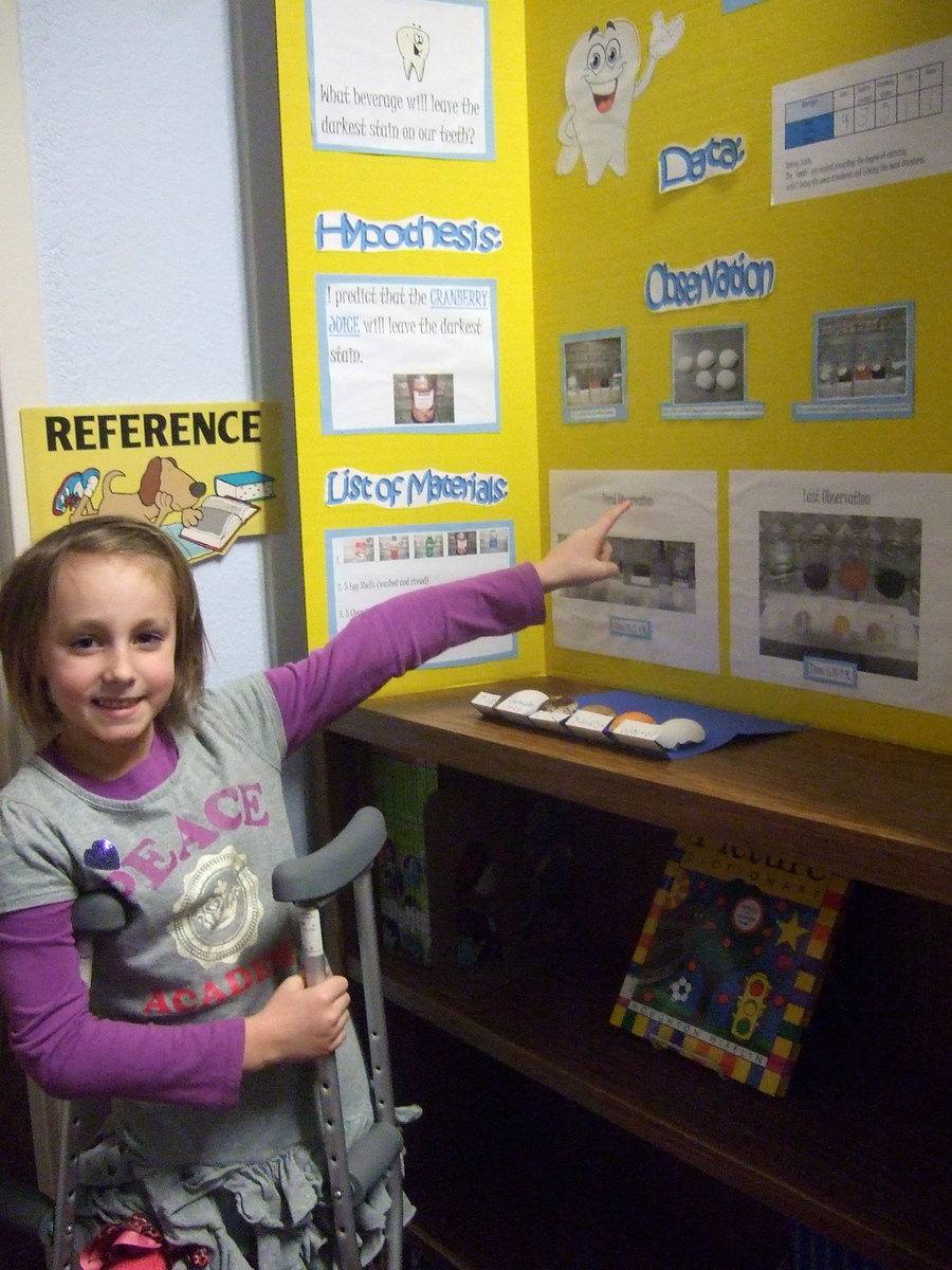 Image: Adyson Mathers (2nd grade) took first place for her science project – what beverage will stain your teeth the darkest?