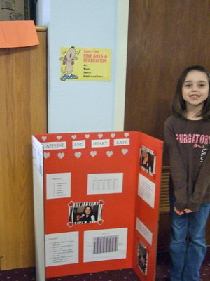 Image: Emily Janek (3rd grader) took third place for her science project.
