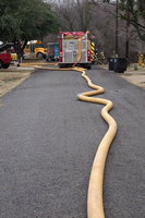 Image: Water is pumped to the scene.