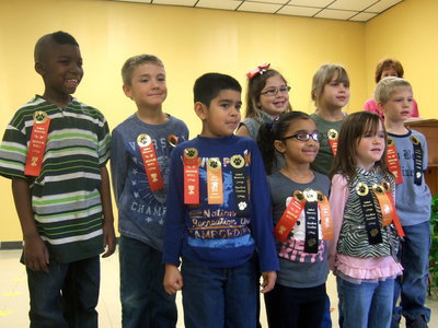 Image: Mrs. Morgan’s first grade class members – all A’s and B’s.