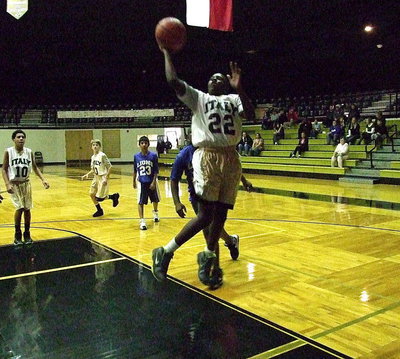 Image: Anthony Lusk(22) lays in 2-points against Blooming Grove.