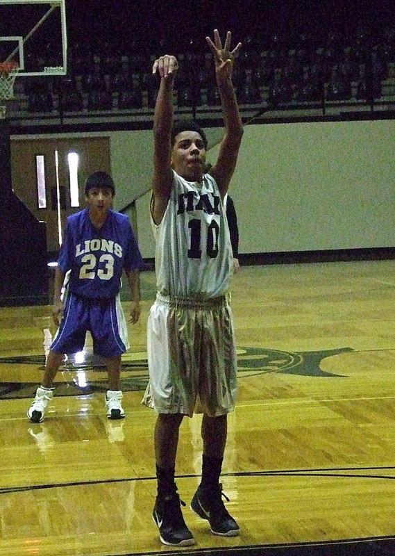 Image: Tylan Wallace(10) works his magic at the free-throw line.