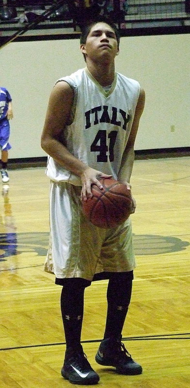 Image: Joe Celis(41) attempts free-throws against Blooming Grove during the 8th grade game.