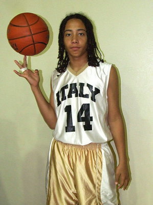 Image: 8th grade Gladiator Devonteh Williams(14) is ready to spin a win for Italy.