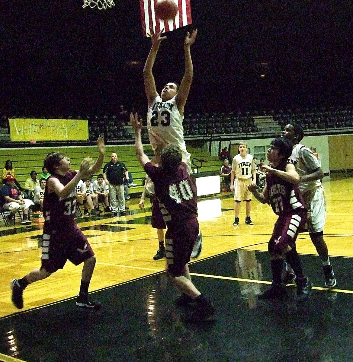 Image: David De La Hoya(23) scores in front of the rim from another galaxy. De La Hoya finished with 10-points against Mildred.