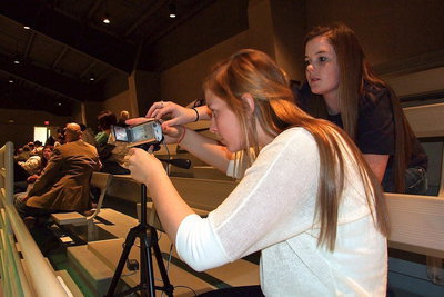 Image: Team managers Madison Washington and Reagan Cockerham teamup to work the video camera.