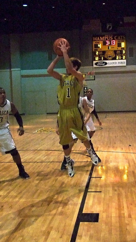 Image: Italy’s Kelvin Joffre(1) pulls up for a quick Jumper in the lane.