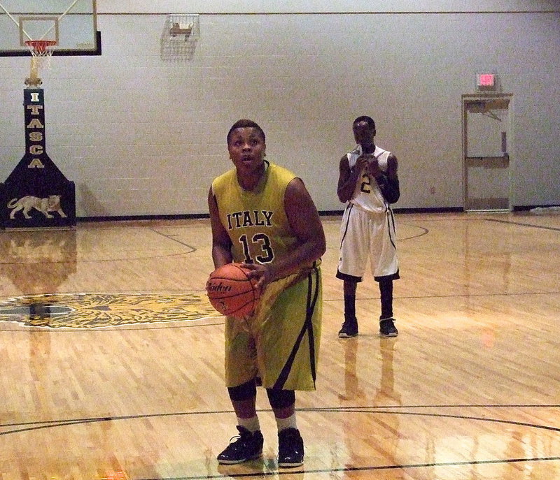 Image: Down the stretch, Darol Mayberry(13) and his Gladiator teammates knocked down one free throw after another to foil Itasca’s comeback hopes. The Gladiators improve to 2-1 in district play by beating the Wampus Cats 56-46.