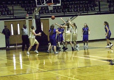 Image: B-Team Lady Gladiator Maegan Connor(21) tries to secure a rebound.