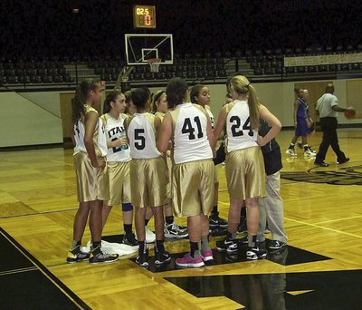 Image: Head coach Lindsey Coffman tries to inspire her A-Team squad.