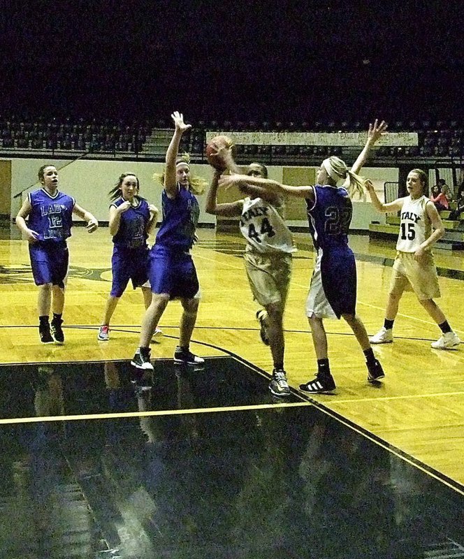 Image: Drawing a shooting foul is Emmy Cunningham(44) as she maneuvers thru Blooming Grove’s defense.