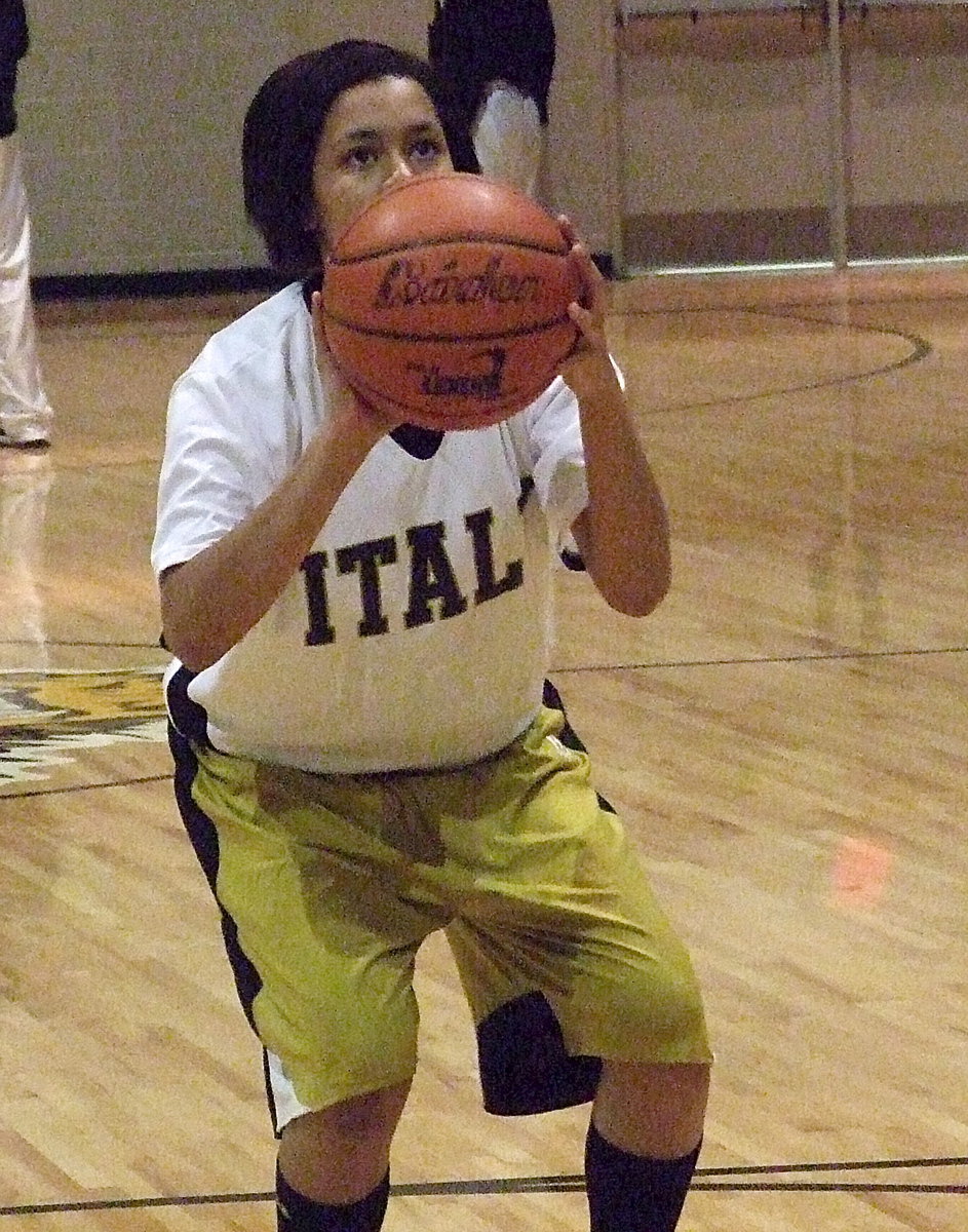 Image: Alex Minton concentrates from the foul line during pre-game hoops.