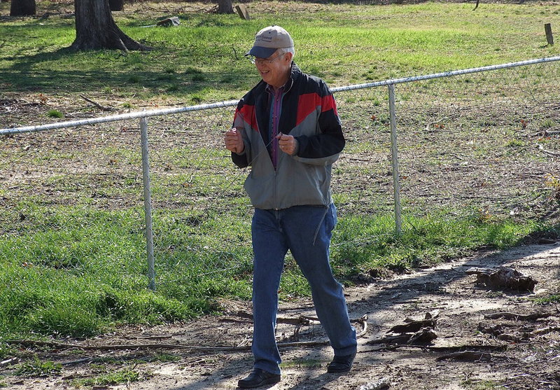 Image: Rex Carey continues the search for unmarked graves in an effort to ensure the loved ones buried at Hughes Cemetery will not be forgotten.