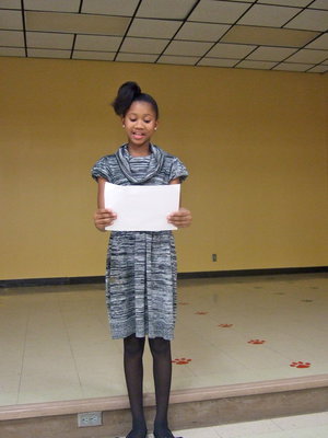 Image: Destiny Harris reciting her poem about Martin Luther King.