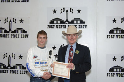 Image: Brandon Connor won a $500 purchase certificate toward a registered beef or dairy heifer for a 4-H or FFA project to exhibit at next year’s Fort Worth Stock Show and Rodeo. The certificate, presented by Ed Bass, FWSSR Chairman of the Board, was sponsored by Frank Kent Cadillac of Fort Worth.