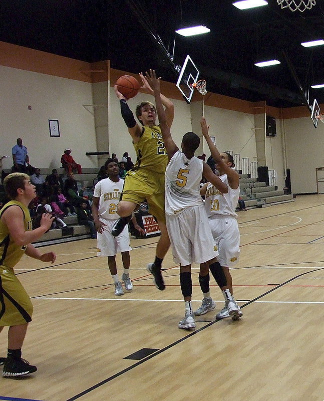 Image: Italy’s 6’,8" senior Cole Hopkins(21) put in 25-points, collected 17 rebounds and had 12 blocks against the Triple A Academy Stallions. Though the Stallions won the district title and are expected to win the 1A state championship, it was Hopkins who stole the show with his triple-double performance.