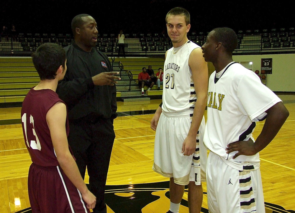 Image: Gladiator Cole Hopkins(21) and Marvin Cox(3) dish out the dome rules before a home game matchup against the Arlington Summitt Skyhawks.