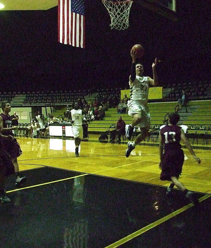 Image: Cole Hopkins(21) shows the skills against Arlington Summitt.