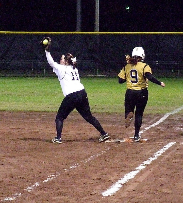 Image: A Hubbard runner just beats the throw as Breyanna Beets(11) makes the catch.