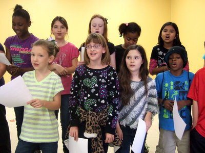Image: Third graders singing up a storm.