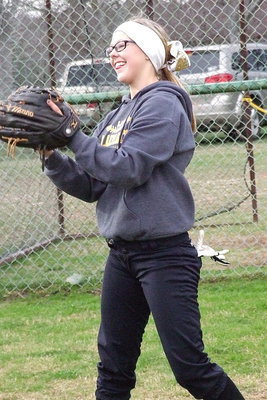 Image: Bailey Eubank is just-a-grinning in anticipation of the Lady Gladiators’ 2013 softball season.