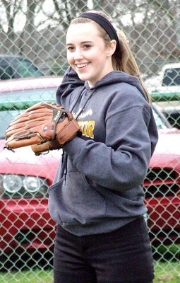 Image: Kelsey Nelson is wearing a mitt and a smile.