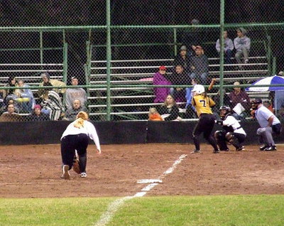 Image: Third baseman Katie Byers(13) stalks the Jaguars from third base.
