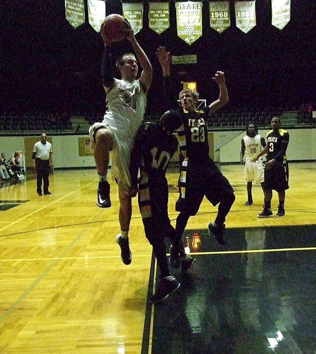 Image: Senior Cole Hopkins(21) led the Gladiator effort with 18-points during senior night to help Italy beat Itasca 53-39 and seal 2nd place in district for the old gold and white.