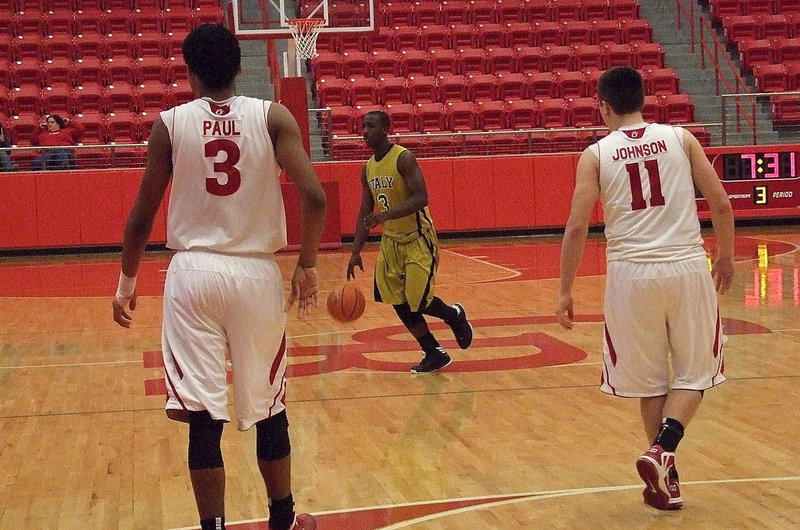 Image: Marvin Cox(3) brings the ball up as Italy is forced into a half court set.