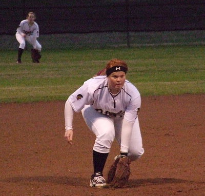 Image: Third baseman Katie Byers(13) is hoping for the ball at the third-base.