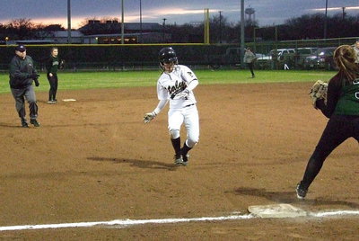 Image: Bailey Eubank steals third-base by beating the throw.