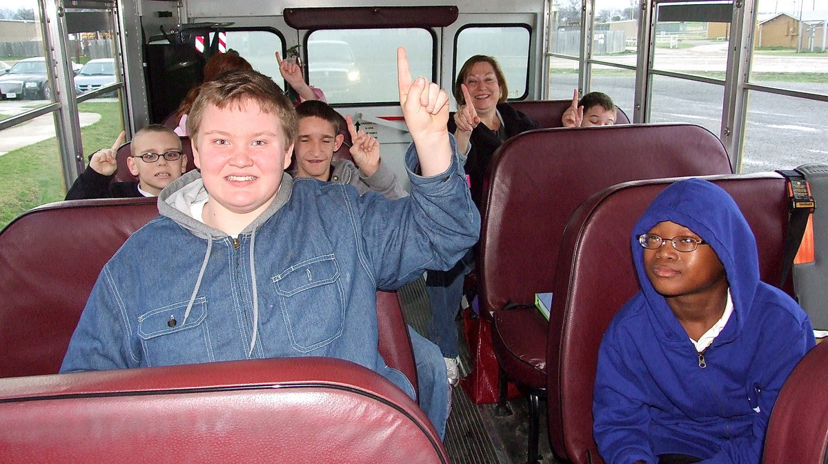 Image: Italy ISDs special athletes are exiting to be leaving for the Special Olympic basketball challenge in Cedar Hill after receiving cheers from the Italy HS student body as they boarded the bus.