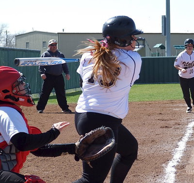 Image: Italy’s Katie Byers(13) tries to score teammate Paige Westbrook(10) from third-base.