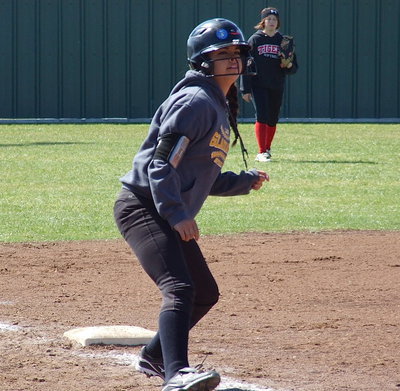 Image: Freshman Ashlyn Jacinto aggressively looks for a chance to score from third-base as Italy routes Terrell.
