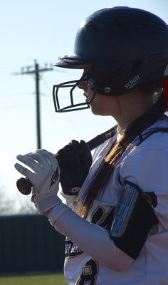 Image: Lady Gladiator Morgan Cockerham makes up her mind to hit and then knocks one into right field.