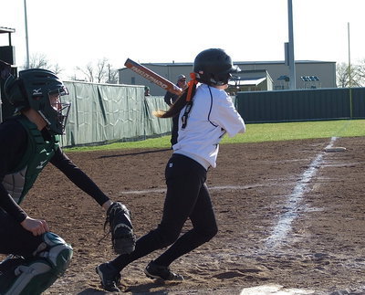 Image: Lady Gladiator Morgan Cockerham(8) sends one into right field for a single.