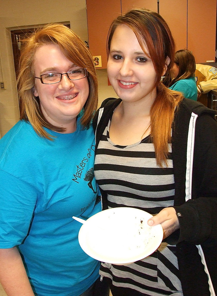 Image: Spotlight operator Emily Stiles and light board technician Katelyn Smith brighten the mood during the ice cream social that followed the play.