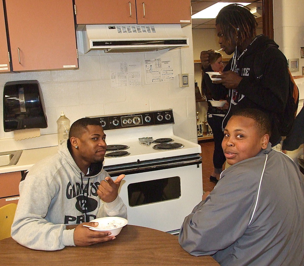 Image: Ryheem Walker and Darol Mayberry compliment Jalarnce Lewis (on the left) on his dramatic curtain pulling skills during the ice cream social.