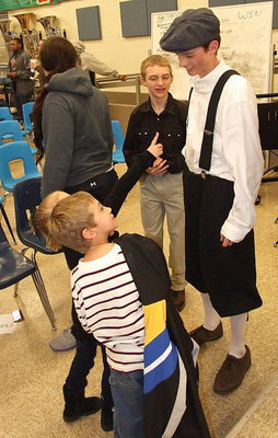 Image: Ty Windham, or “Marco,” is greeted by his cousins at the conclusion of the play.