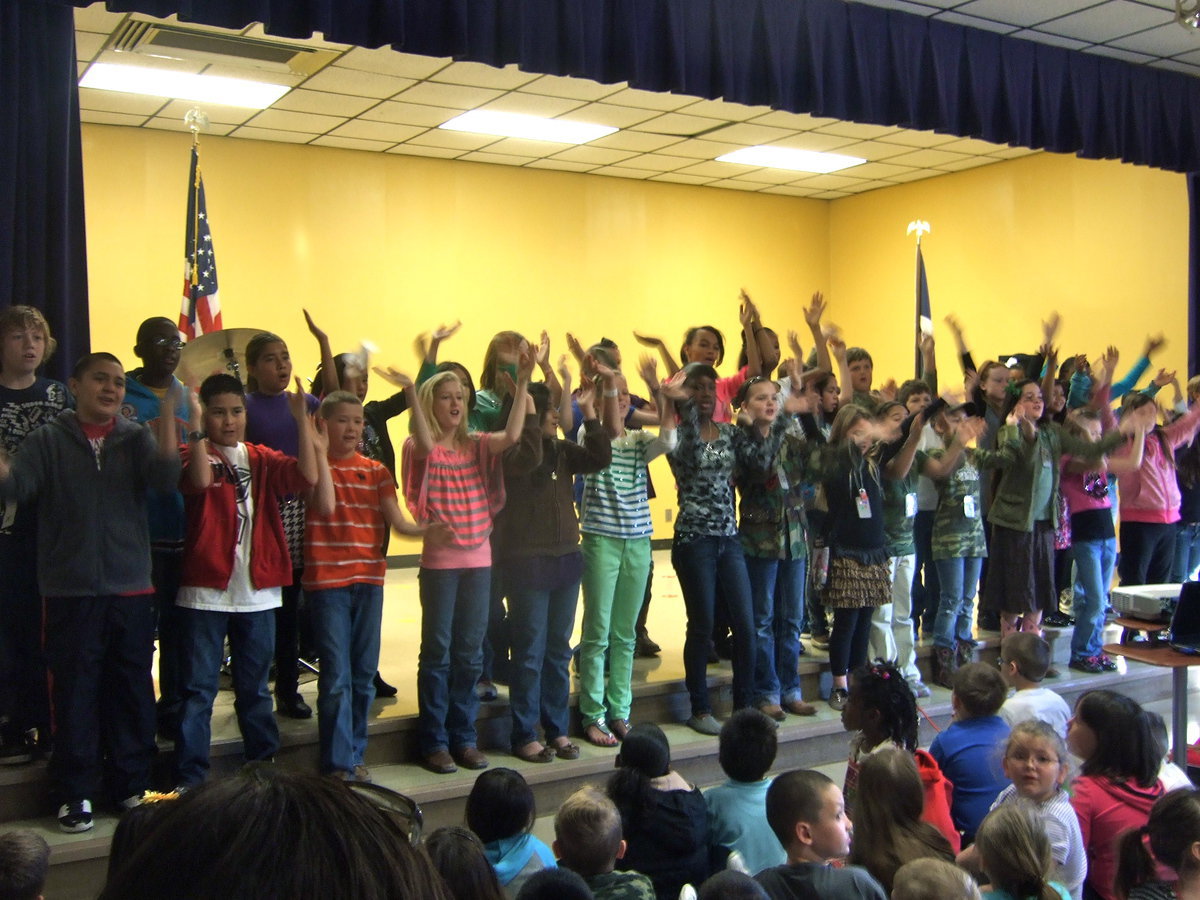 Image: The Stafford Choir singing enthusiastically.