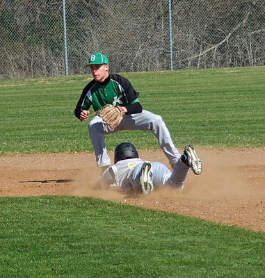 Image: Italy’s Caden Jacinto(2) slides safely into second-base.