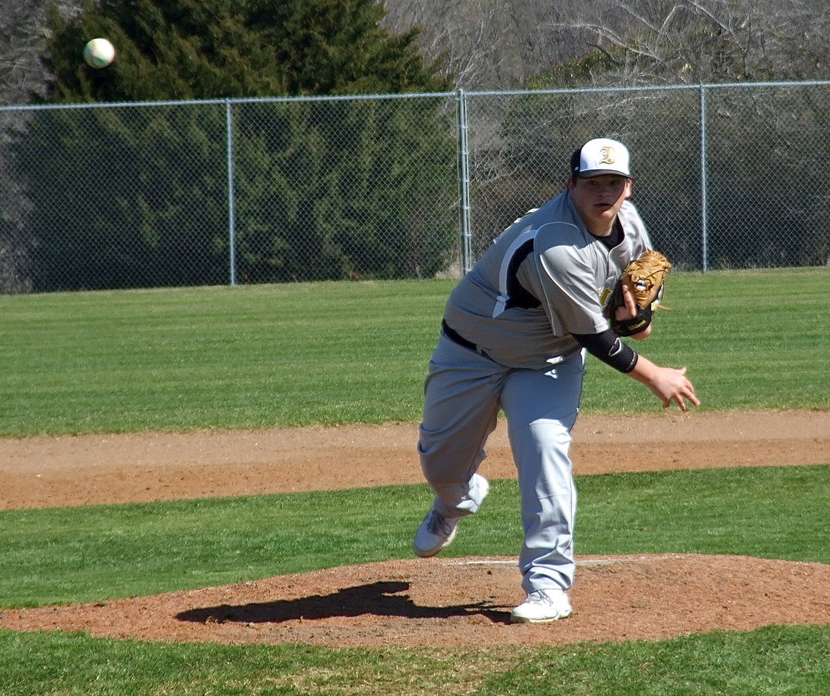 Image: John Byers(18) works from the mound for Italy.