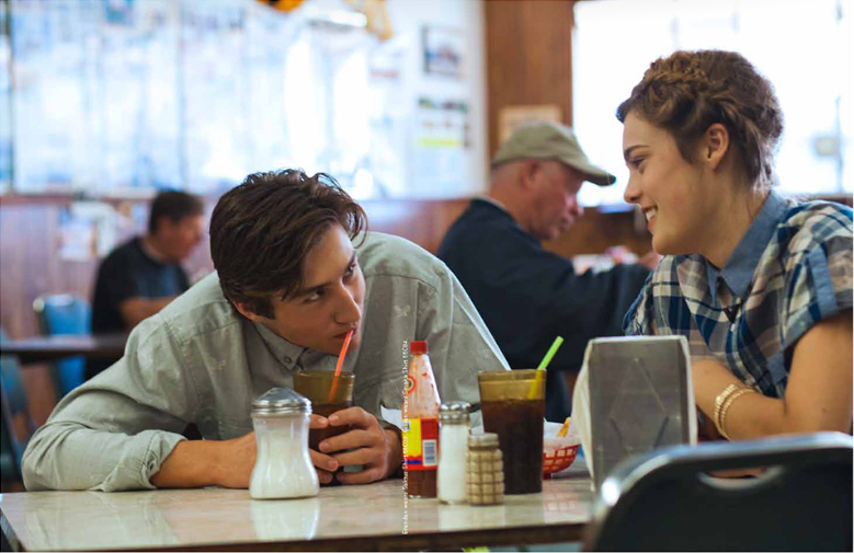 Image: Main characters, Brenden Reza and Gillian Vanderslice, pose for photos throughout the production while appearing in a short film recently produced in Italy, Texas for italian based fashion company 55dsl.com / facebook.com/FiftyFiveDSL Reza and Vanderslice enjoy cold beverages inside the famous Italy Uptown Cafe which is owned by Doris Mitchell with service and entertainment provided by waitress and daughter Sandy Eubank.