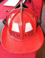 Image: The back of Lieutenant Greg Pickard’s fire helmet.